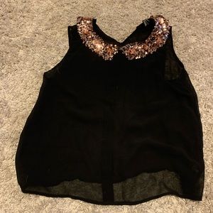 Black tank top with metallic gold sequin neck